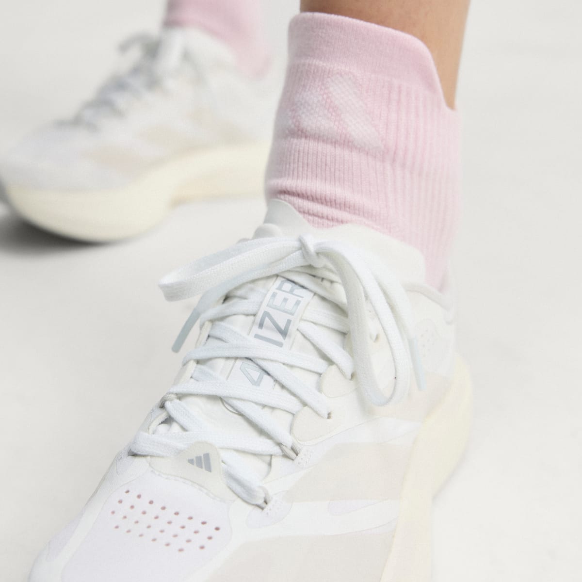adidas Women's Adizero EVO SL EXO Shoes - Cloud White / Zero Metalic / Core White