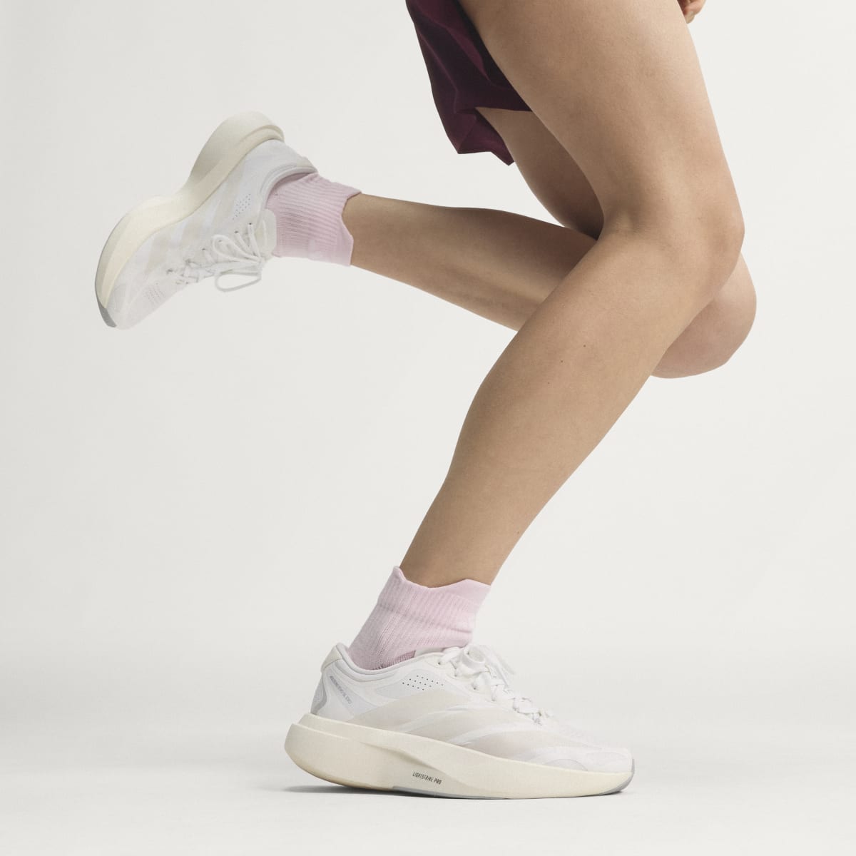 adidas Women's Adizero EVO SL EXO Shoes - Cloud White / Zero Metalic / Core White