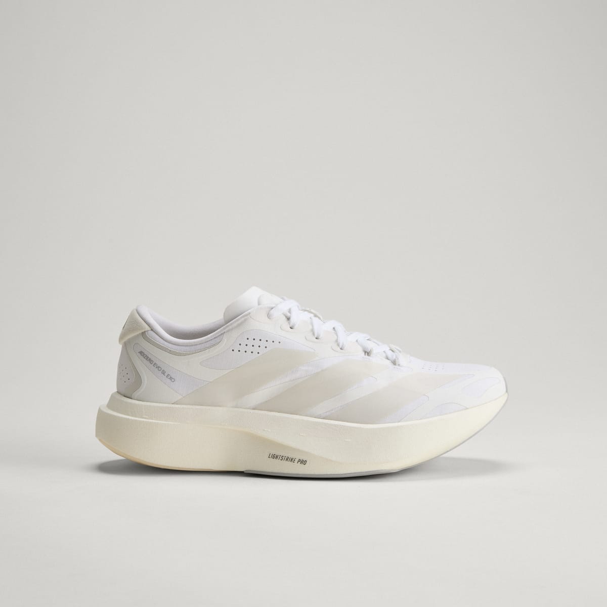 adidas Women's Adizero EVO SL EXO Shoes - Cloud White / Zero Metalic / Core White