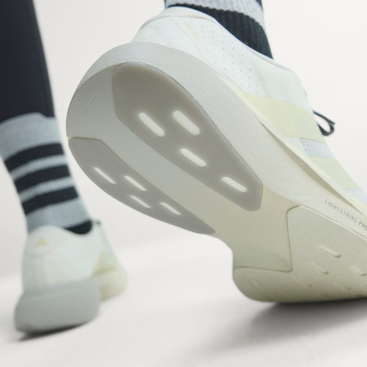 adidas Women's Adizero EVO SL Shoes - Off White / Ice Gold Met. / Granite