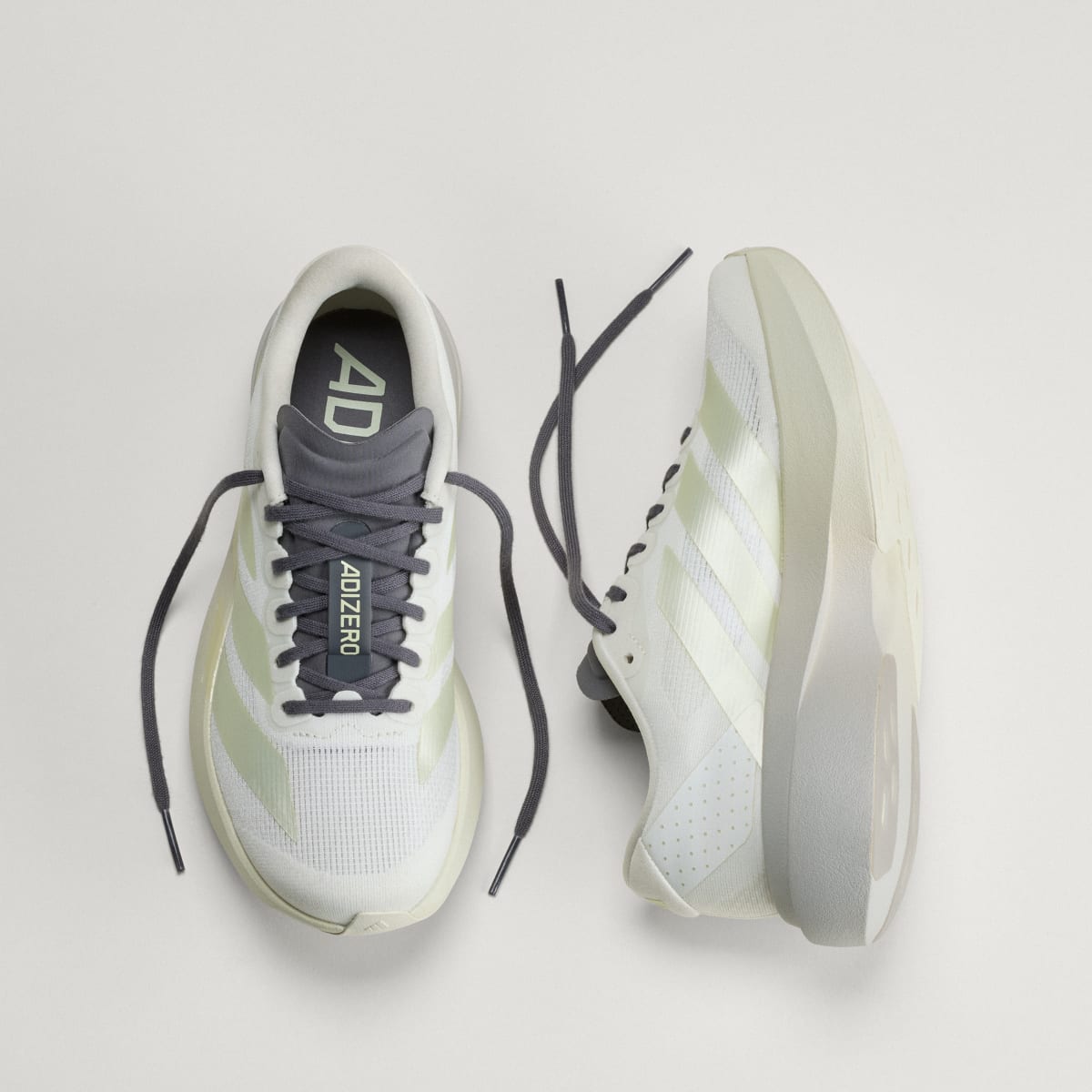 adidas Women's Adizero EVO SL Shoes - Off White / Ice Gold Met. / Granite