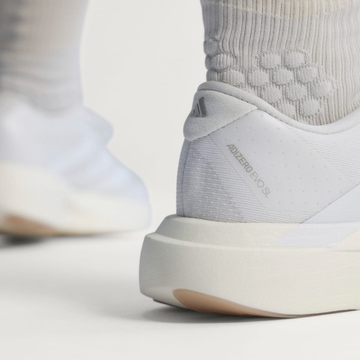 adidas Women's Adizero EVO SL Shoes - Cloud White / Cloud White / Warm Sandstone