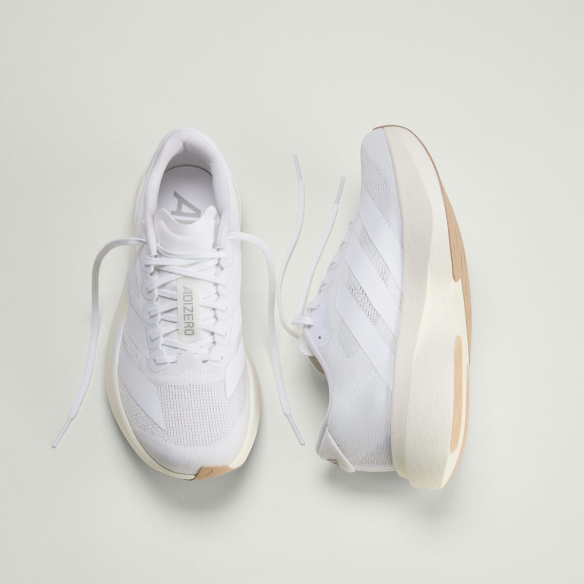 adidas Women's Adizero EVO SL Shoes - Cloud White / Cloud White / Warm Sandstone
