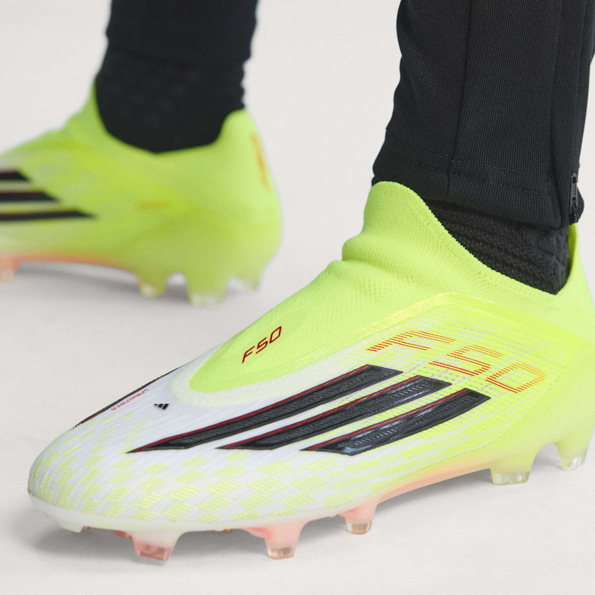 adidas Women's F50 Elite Laceless Firm Ground Soccer Cleats - Team Solar Yellow 2 / Core Black / Lucid Red