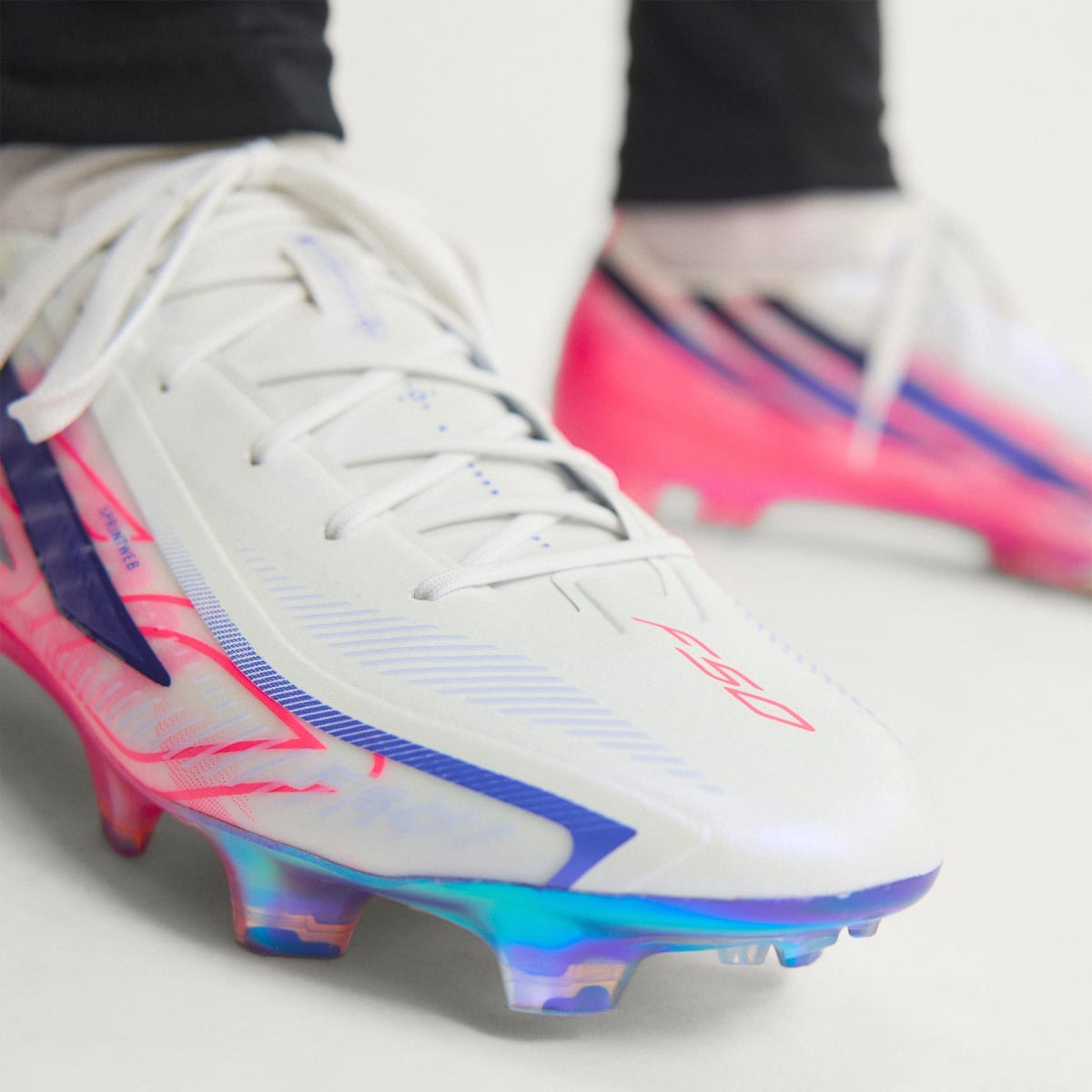adidas Women's F50 Hyperfast Elite Firm Ground Soccer Cleats - Cloud White / Solar Purple / Solar Turbo