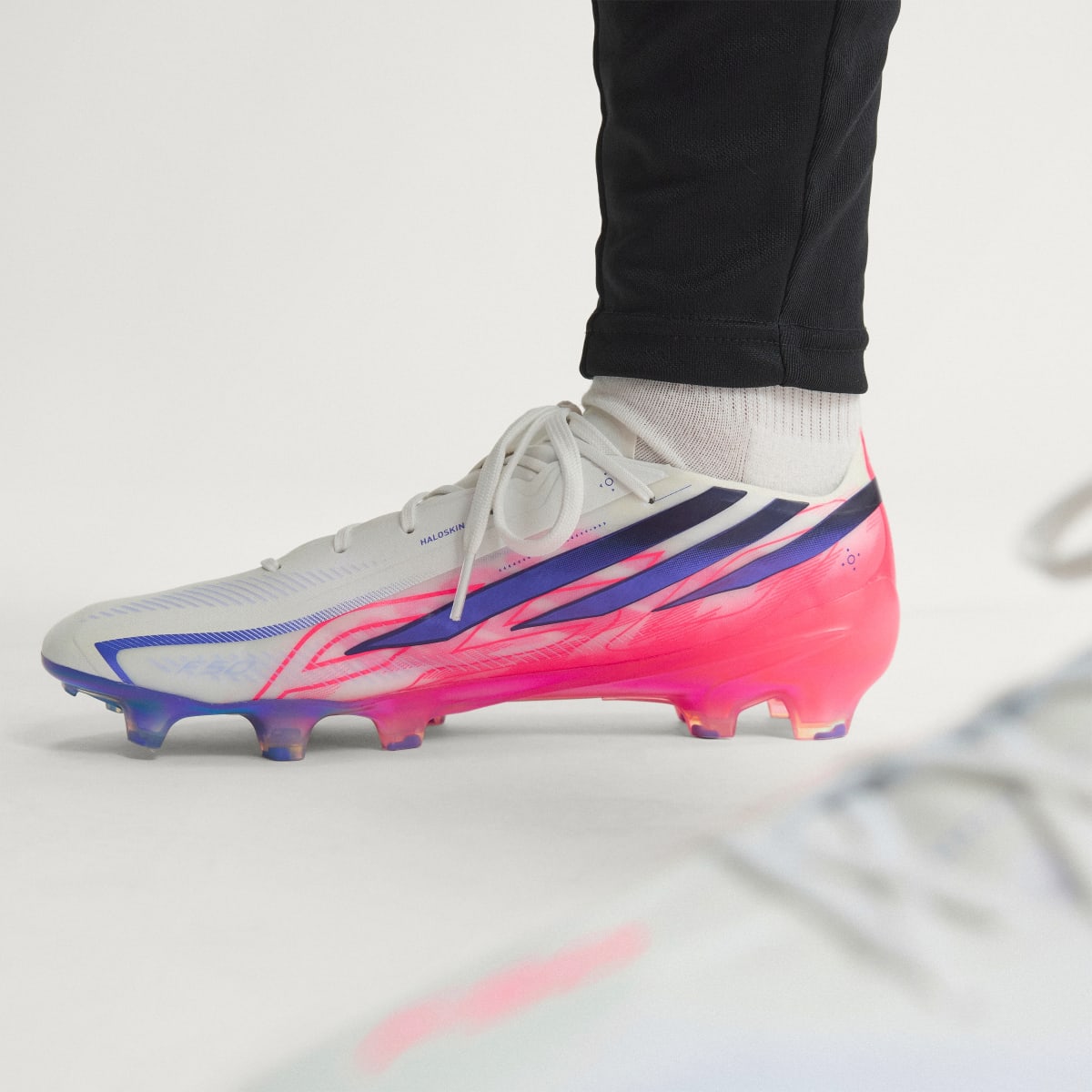 adidas Women's F50 Hyperfast Elite Firm Ground Soccer Cleats - Cloud White / Solar Purple / Solar Turbo