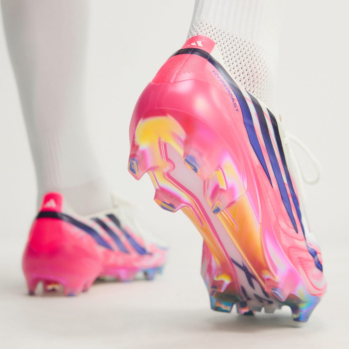 adidas Women's F50 Hyperfast Elite Firm Ground Soccer Cleats - Cloud White / Solar Purple / Solar Turbo