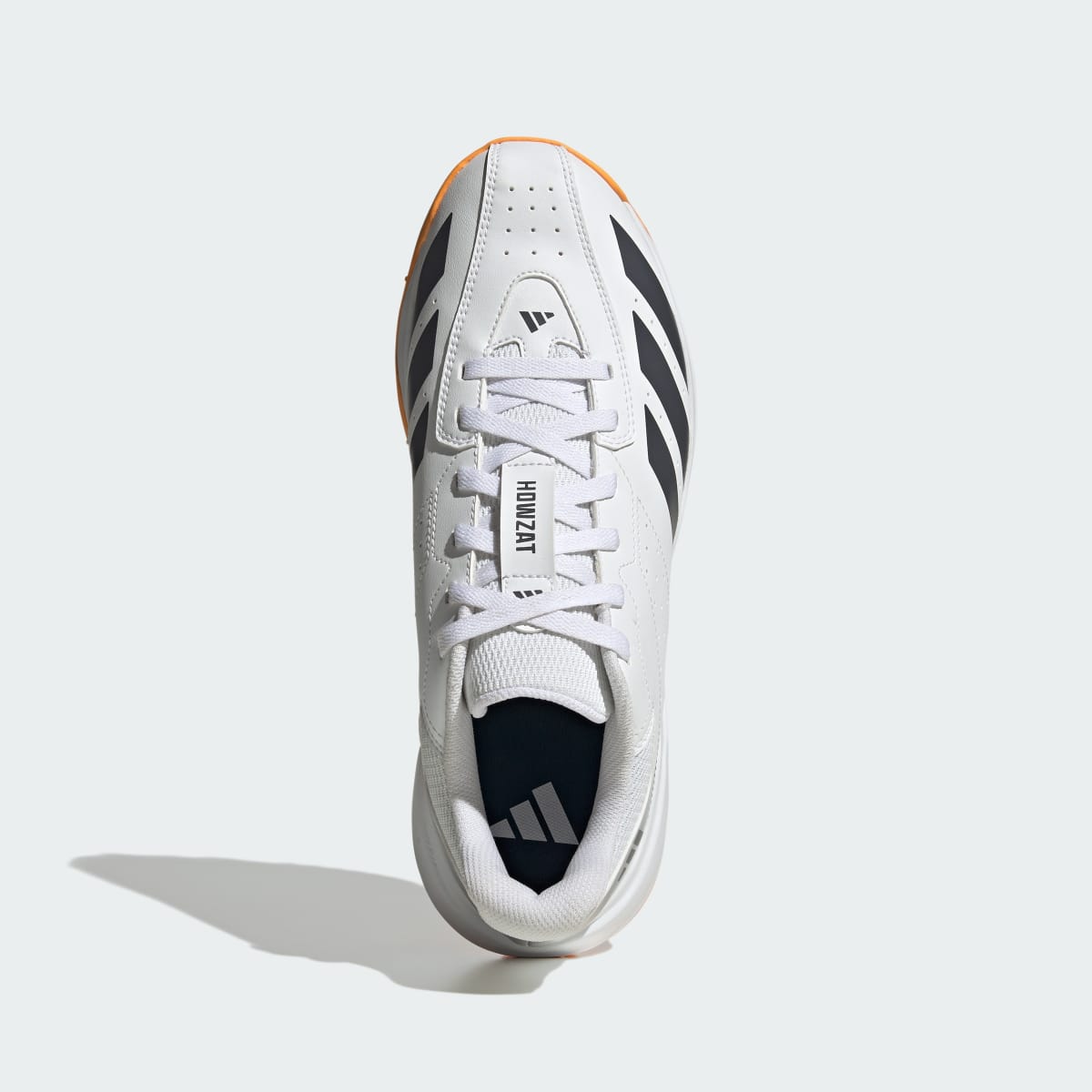 adidas Men's Howzat Spikeless Cricket Shoes - Cloud White / Aurora Onix / Lucid Tangerine